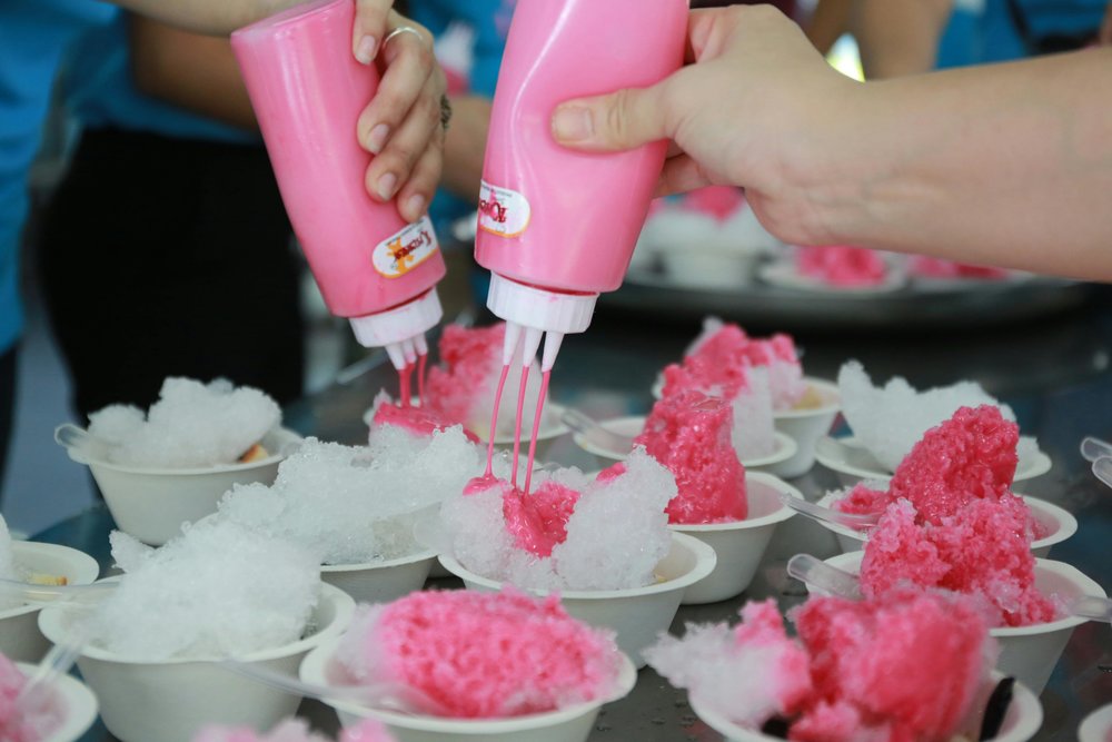 Nom Yen, a pink Thai dessert / drink made from milk and rose syrup