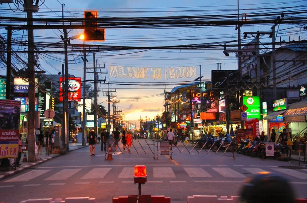 facade of the lively Bangla Road amidst the sunset