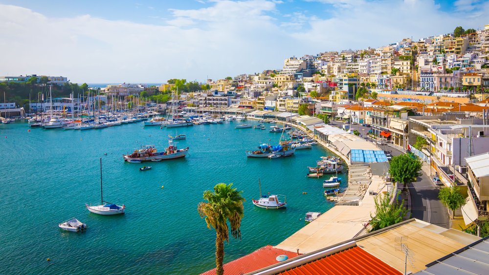 Harbor area near Athens with boats and seaside buildings