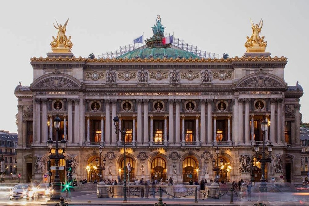 Palais Garnier opera house with ornate facade and golden statues