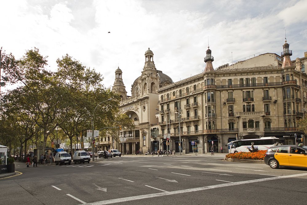 Passeig de Gràcia in Barcelona with elegant buildings and busy street scene