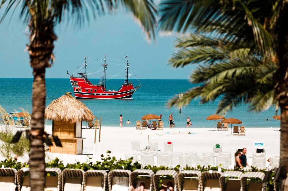 Bright white sand and clear water at Clearwater Beach