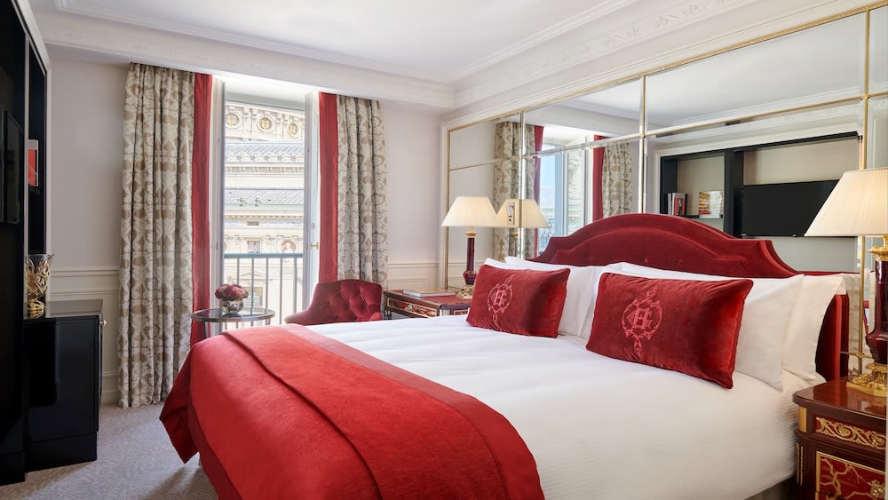 Plush red velvet cushions at InterContinental Paris Le Grand