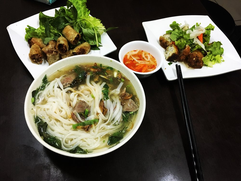 Classic Vietnamese favorites: beef noodle soup, fried spring rolls, and fried shrimp rolls / Photo Credits: Yuriy Kosygin on Wikimedia Commons