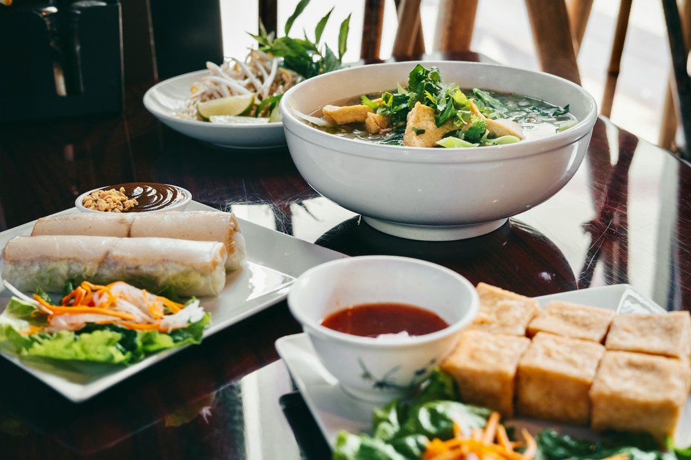 Pho, spring rolls, and a tofu dish
