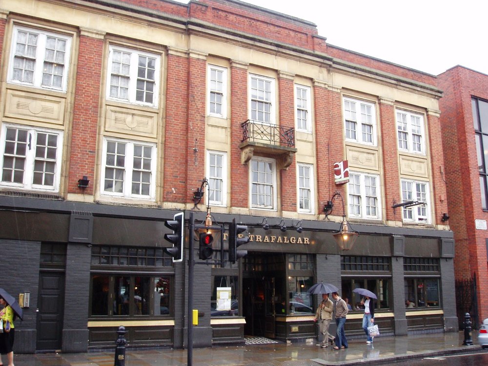 Exterior of The Trafalgar pub in London near Trafalgar Square on a rainy day
