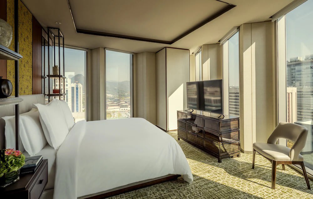 Luxury hotel room at Four Seasons Hotel Seoul with large windows