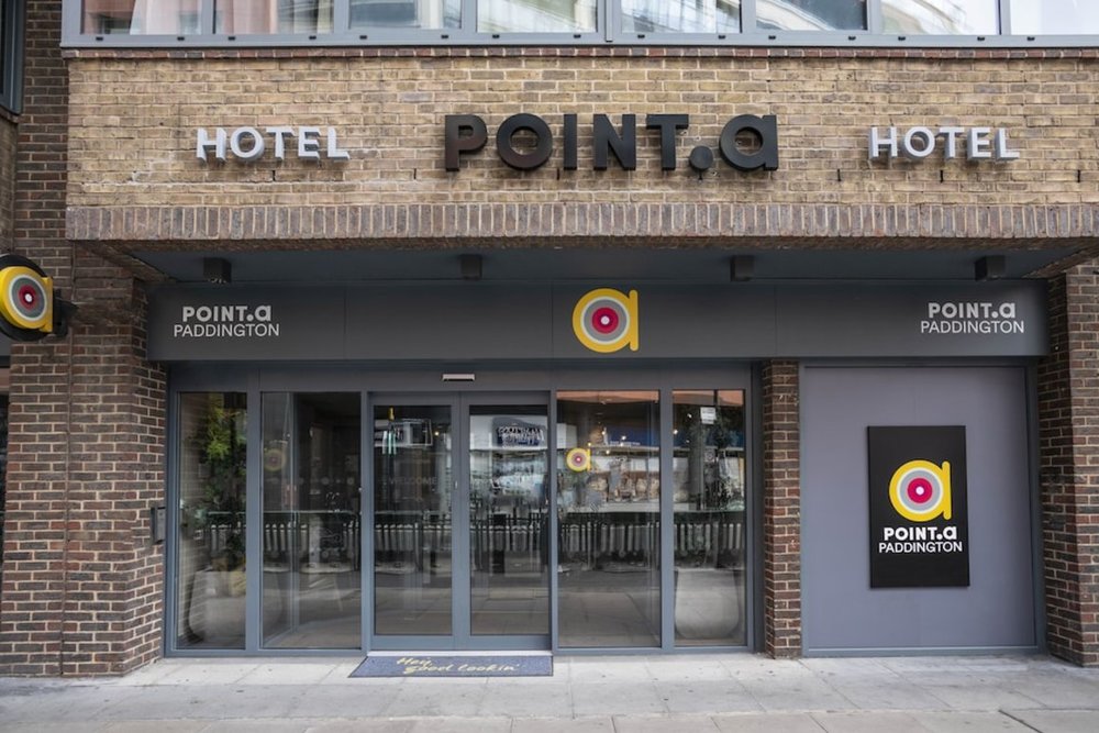 Exterior of Point A Hotel Paddington with modern entrance and signage in London