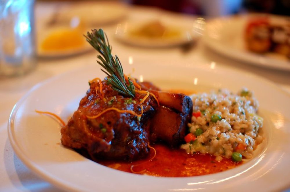 Osso Buco with risotto barley on a plate