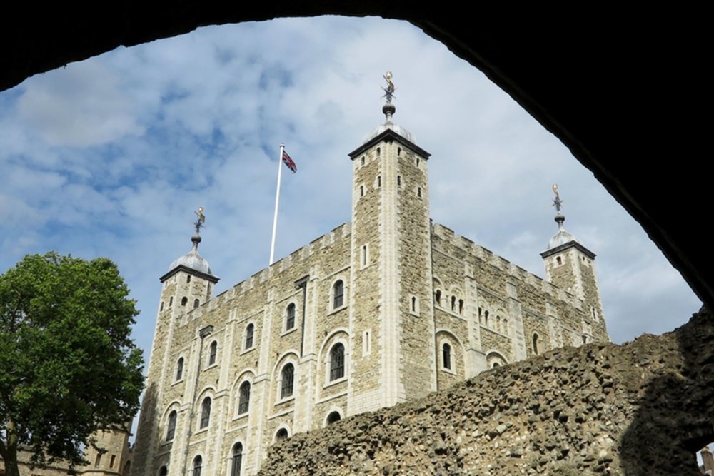The Tower of London stone walls and towers on a clear day