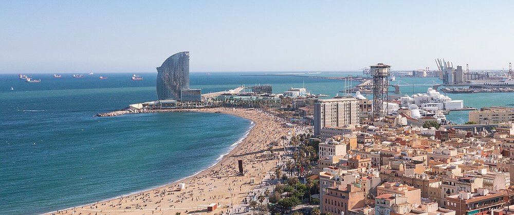 an aerial shot of Barceloneta Beach
