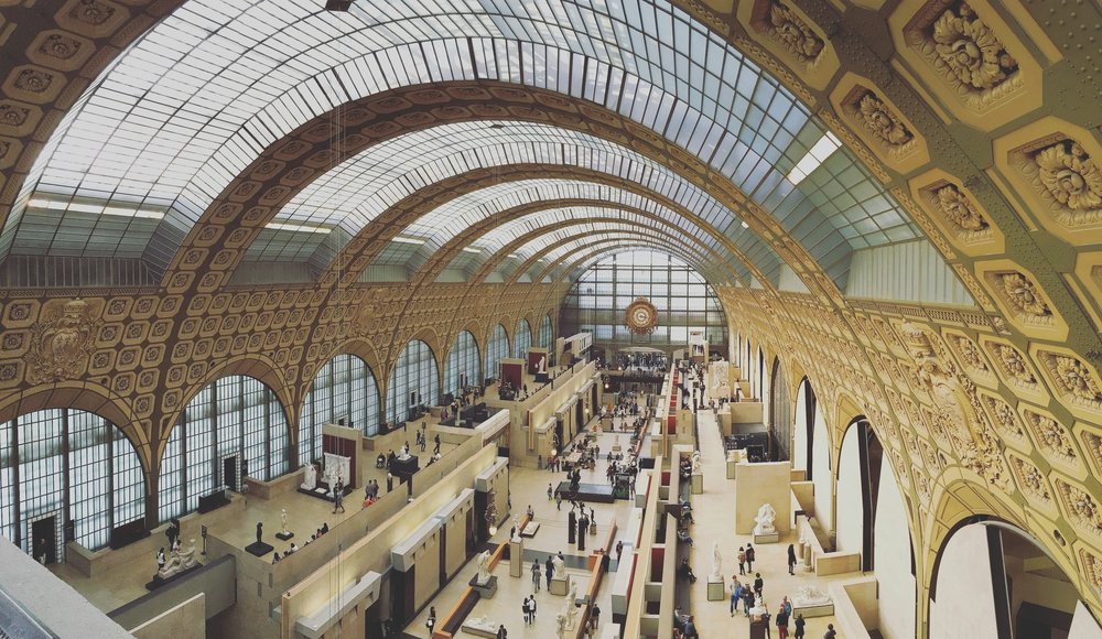 Bask in art at the Musée d’Orsay main hall.