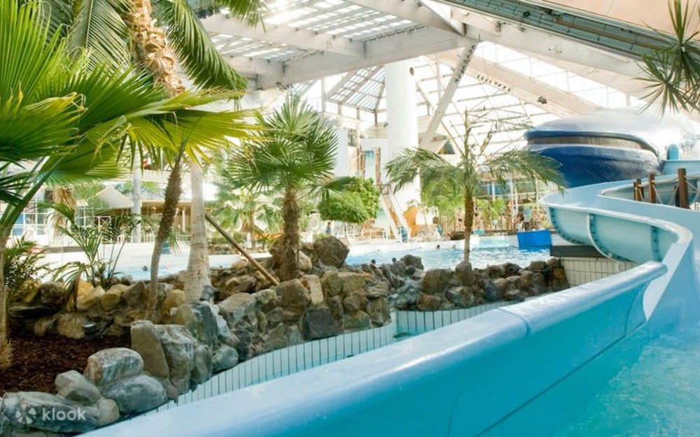 Slide into the cool water at Aquaboulevard in Paris