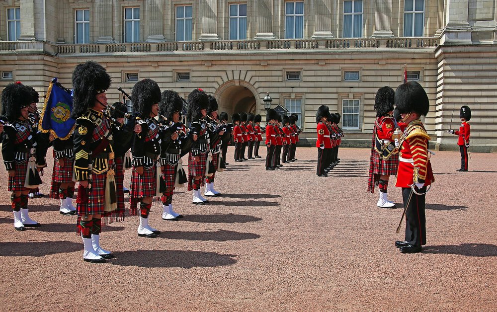 Royal guards performing the Changing of the Guard at Buckingham Palace