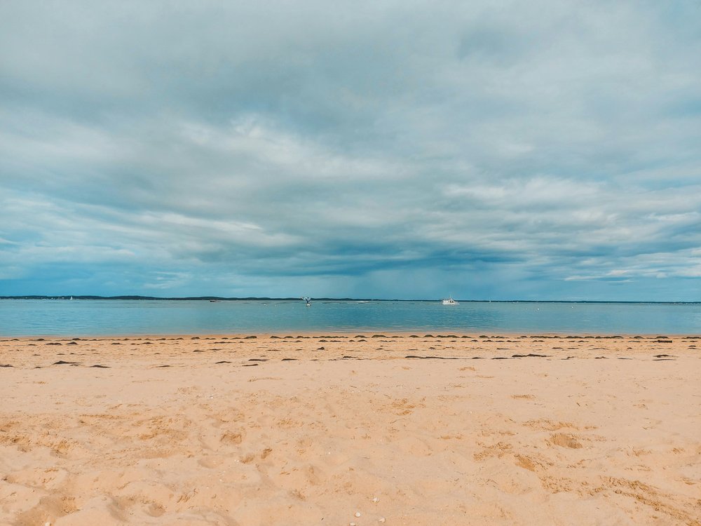 A view of the beach and the ocean at Arcachon Bay.