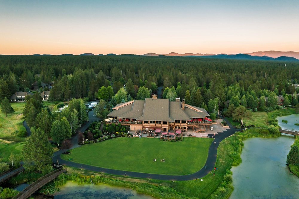 Sunriver Resort surrounded by forests, open lawns, and scenic waterways