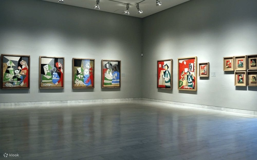 Picasso paintings displayed on gallery walls inside the Picasso Museum in Barcelona.
