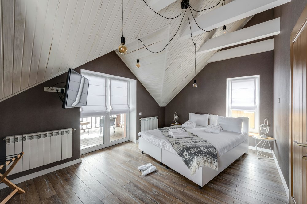 Cozy attic-style hotel room with a modern design | Photo from Max Vakhtbovych on Pexels