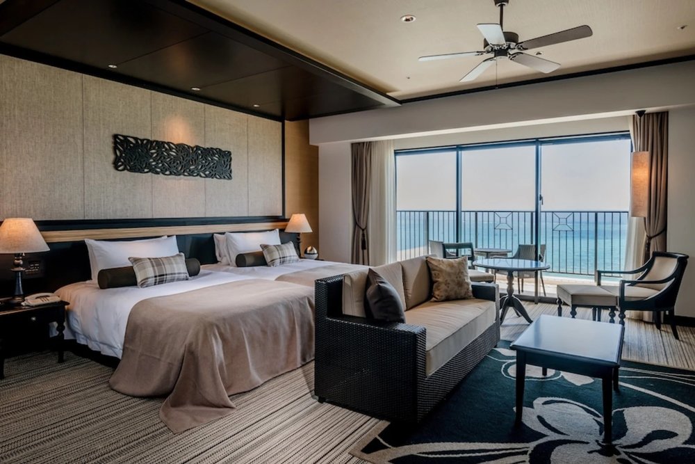 Modern ocean-view guest room at Hotel Monterey Okinawa Spa & Resort