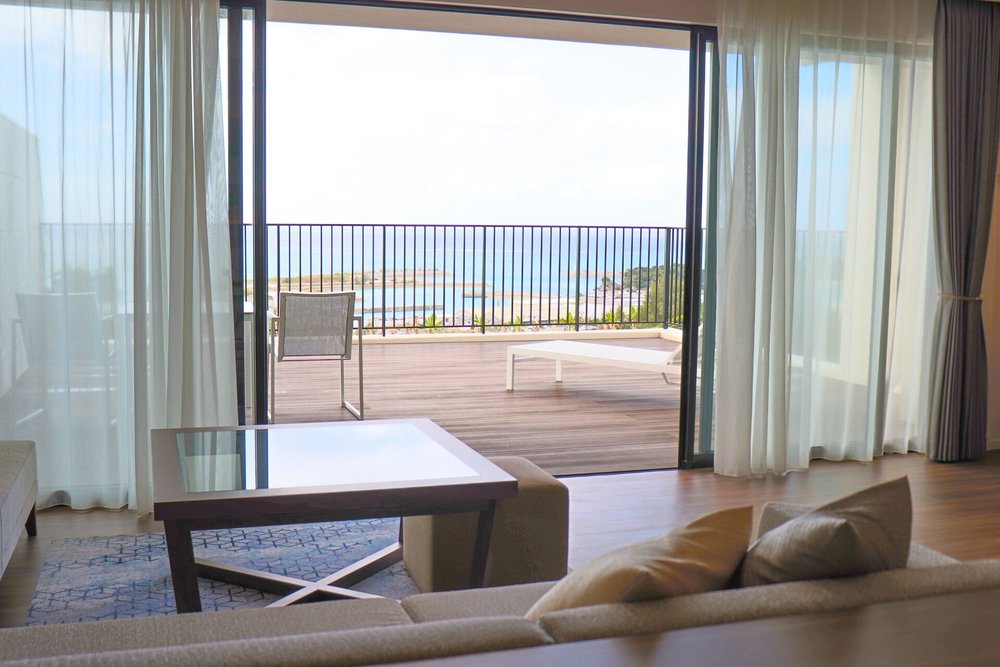 Ocean-view terrace and living space at Hiyori Ocean Resort Okinawa