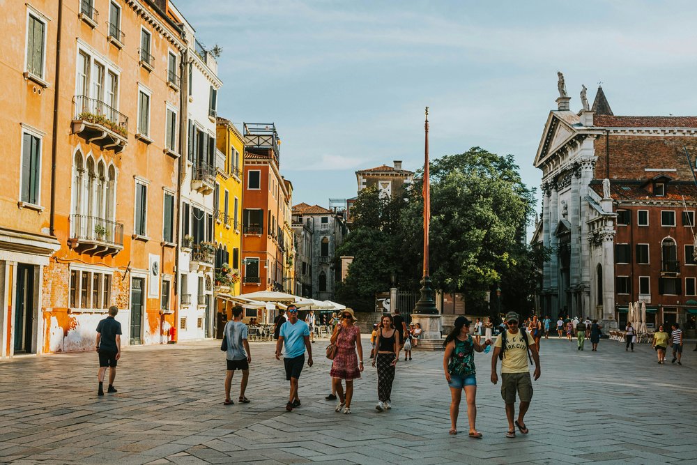 People walking through Campo Santa Margherita square in Venice