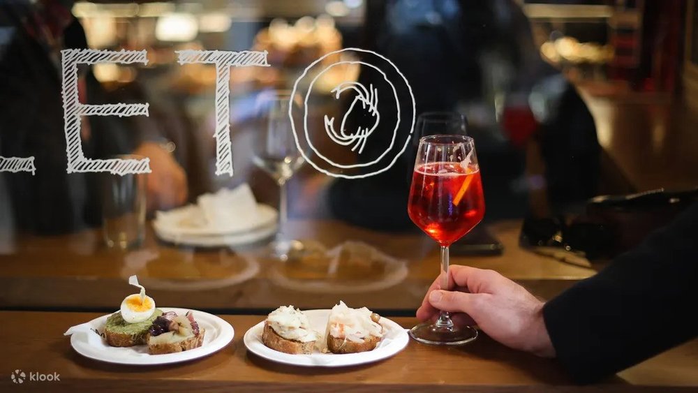 Small Venetian snacks and a glass of spritz at a wine bar