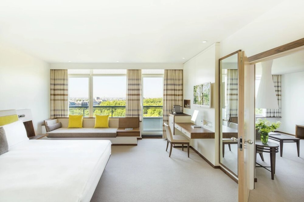Minimalist guest room at COMO Metropolitan London with large windows