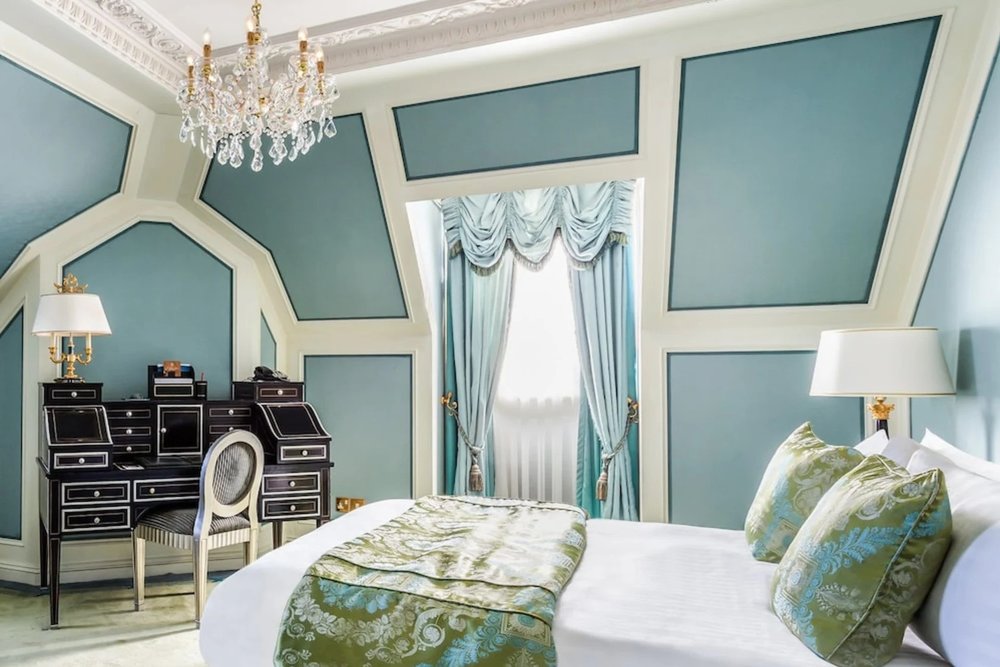 Classic hotel room interior at The Bentley London with chandelier