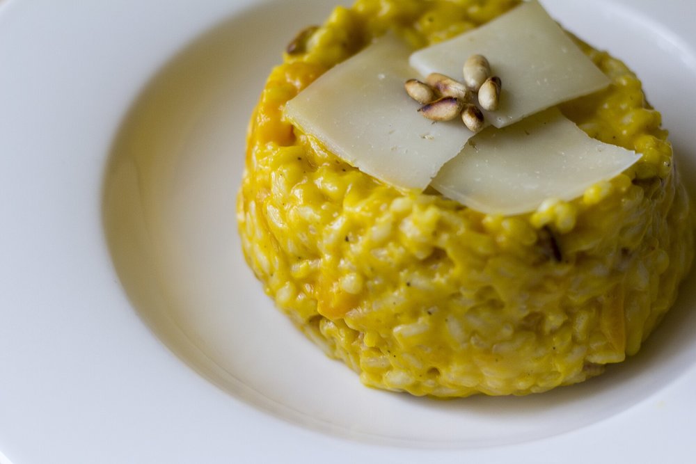 Creamy risotto, cooked slow and served hot! | Photo Credits: Luca Nebuloni on Wikimedia
