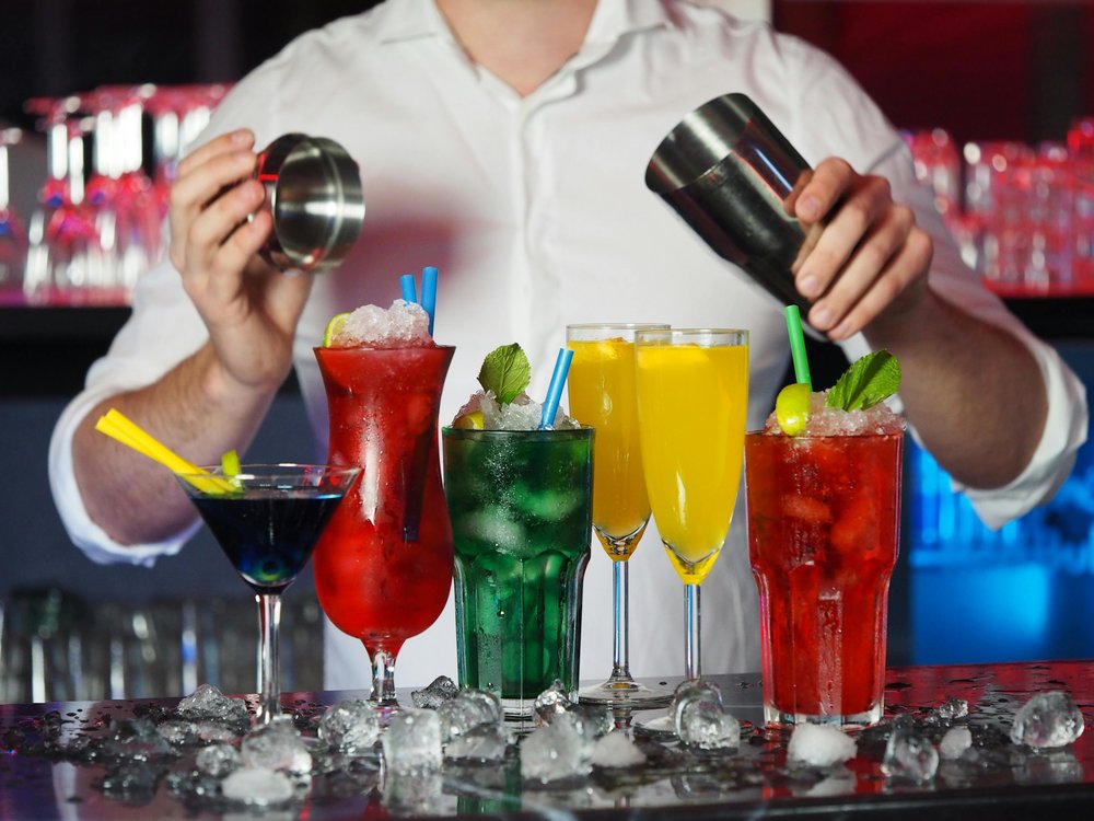 Bartender preparing a variety of cocktails at a popular Melbourne bar