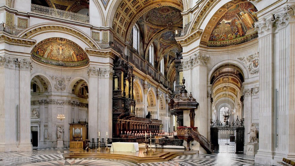Interior of St. Paul’s Cathedral with ornate arches, columns, and altar