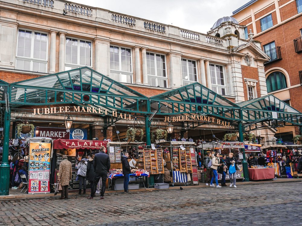  Jubilee Market Hall in Covent Garden with busy stalls and shoppers | Photo Credit: Lorenzo Gerosa on Unsplash