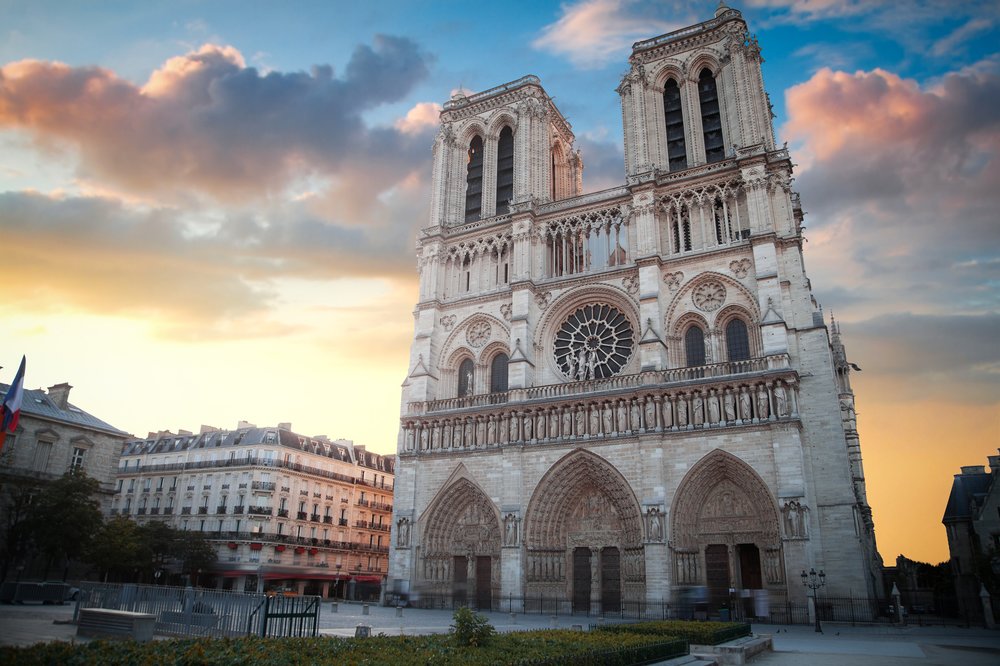 Exterior view of Notre-Dame Cathedral in Paris during golden hour