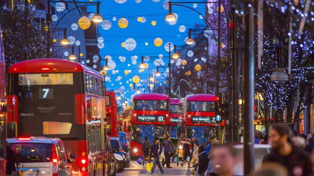 Christmas lights and red buses in central London