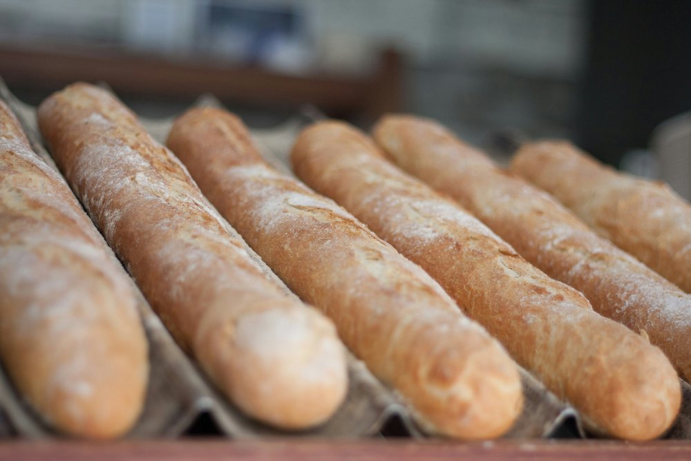 Loaves of freshly-baked baguettes, one of the most famous French dishes