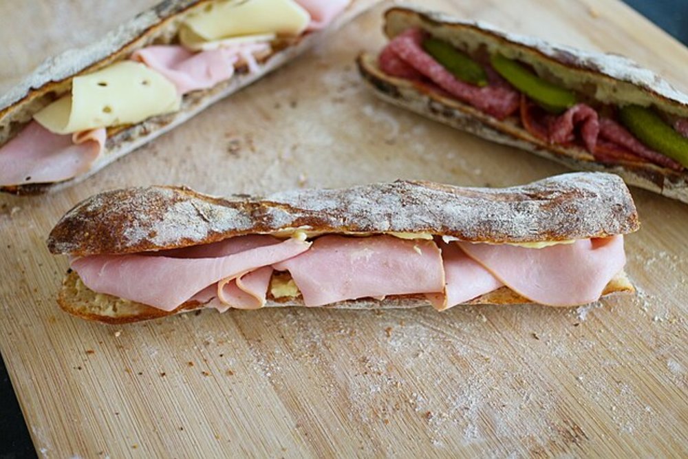 A jambon beurre, a baguette with ham and butter, a popular lunchtime meal in Paris.