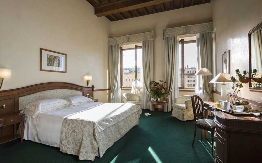 Classic hotel room with Arno River charm at Hotel degli Orafi