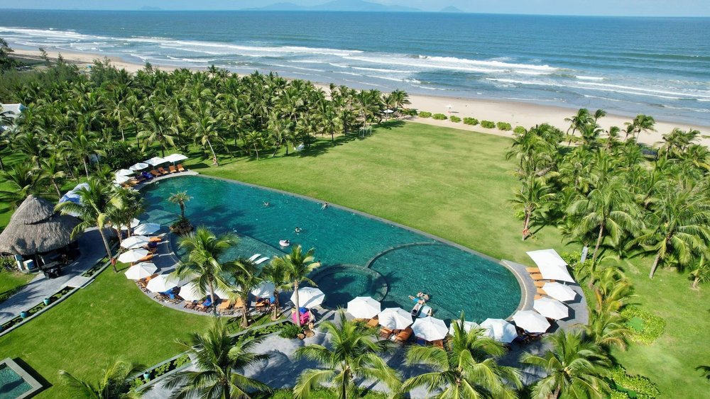 Oceanfront infinity pool at Bliss Hoi An Beach Resort & Wellness