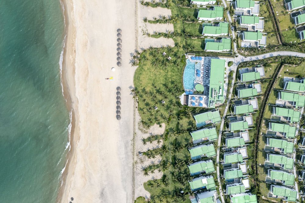 Aerial view of Wyndham Hoi An Royal Beachfront Resort along the beach