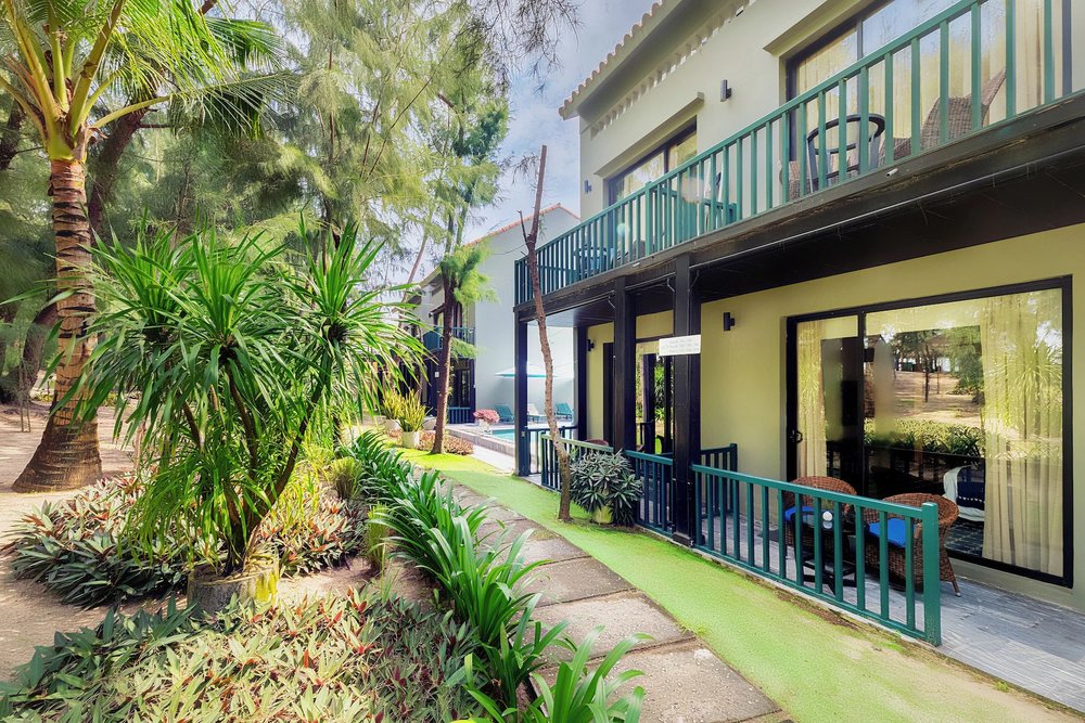 Sol An Bang Beach Resort rooms set among tropical greenery