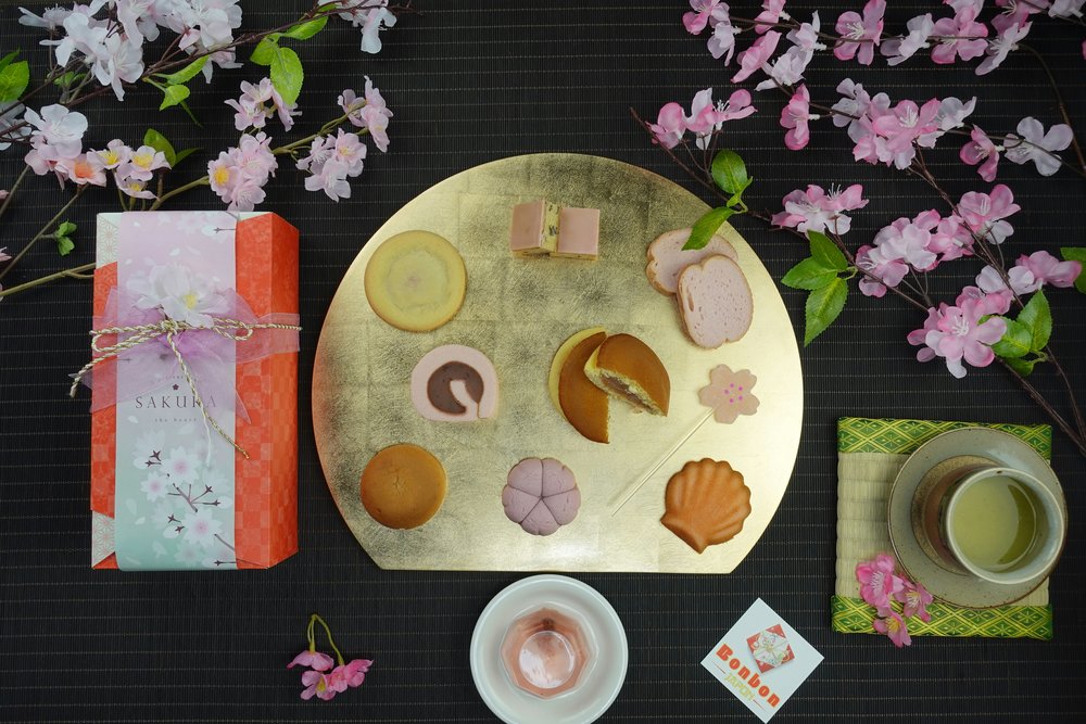 Photo caption + alt text: A spread of wagashi, Japanese sweets | Photo by Christian Laborde on Unsplash
