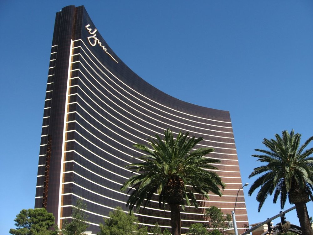 Wynn Las Vegas luxury resort exterior with palm trees and modern design