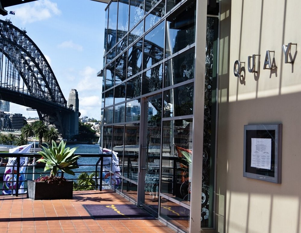 Entrance of Quay Restaurant with Sydney Harbour Bridge in the background