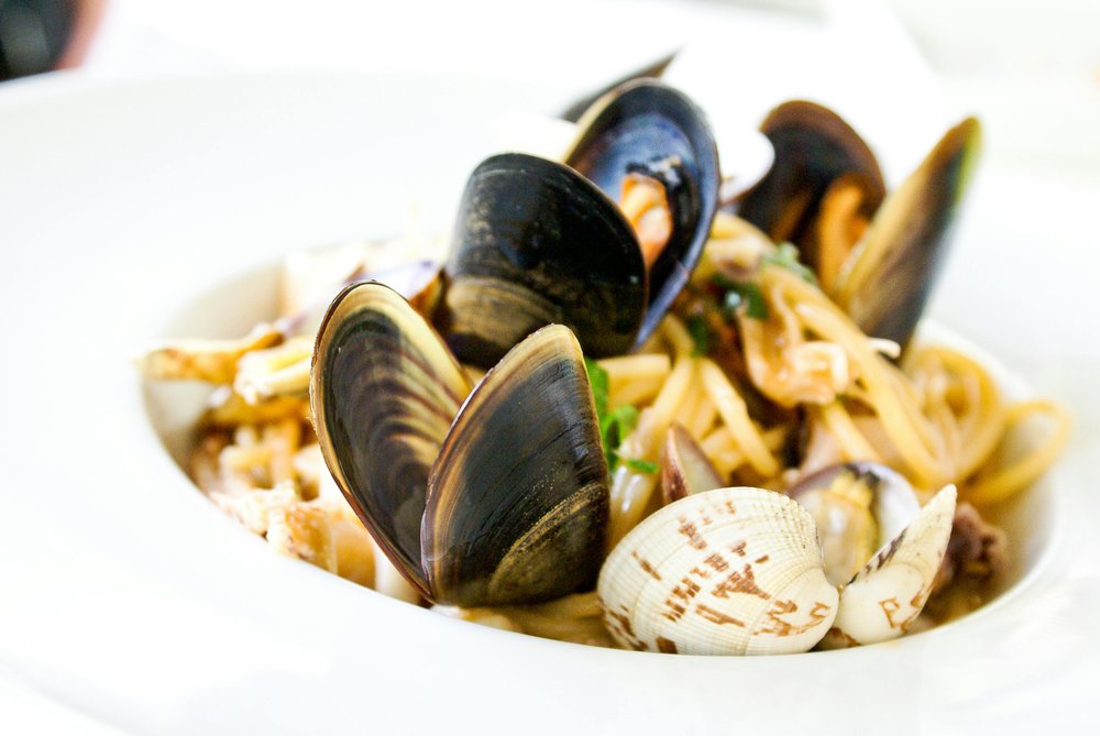 Seafood pasta with mussels and clams in classic Italian style
