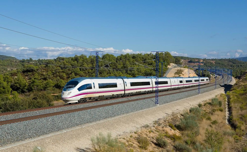 OUIGO high-speed train traveling through the Spanish countryside | Photo Credit: Lex