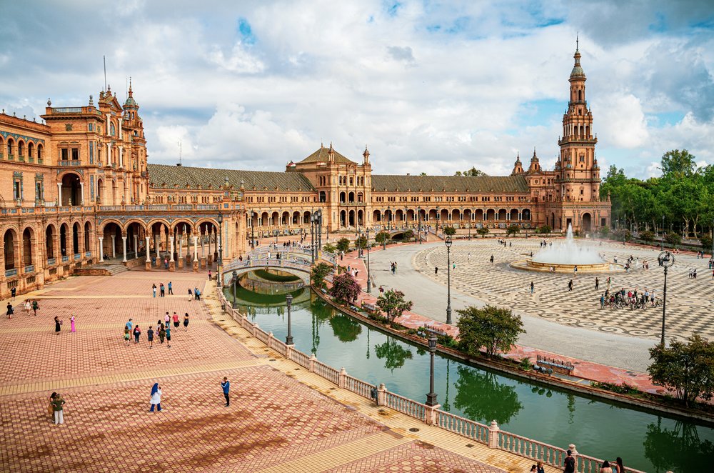 Plaza de España in Seville with historic architecture and canal | Photo Credit: Taisia Karaseva on Unsplash