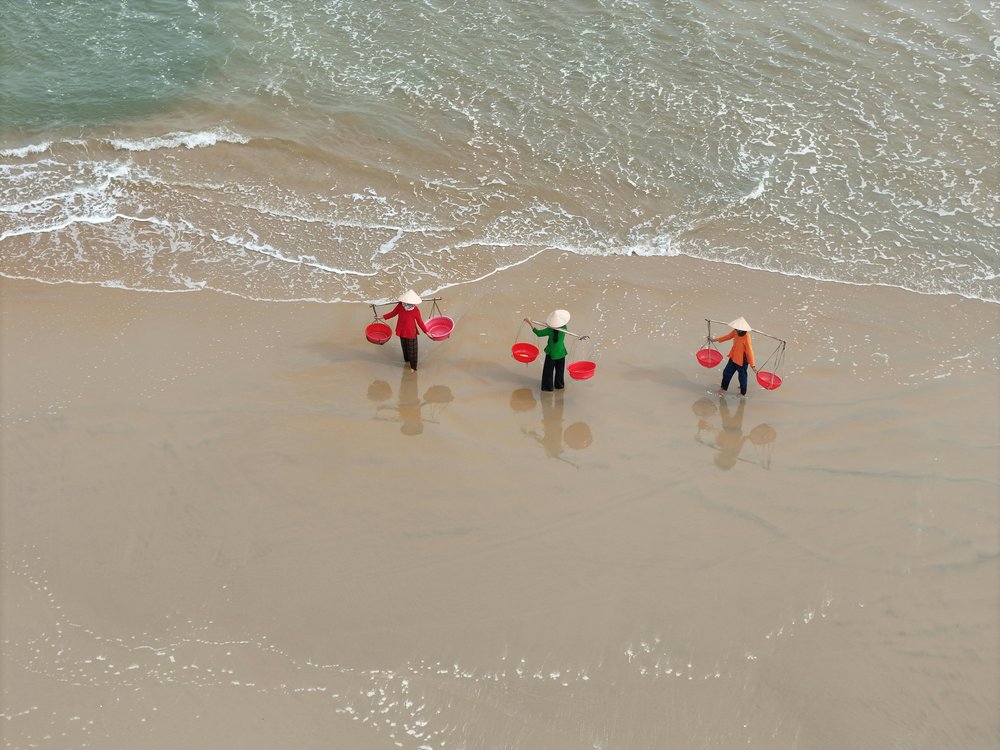 Fishermen on Hidden Beach Hoi An