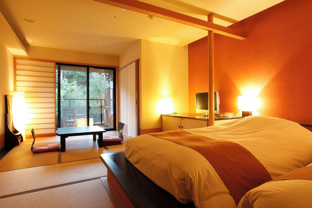 Traditional tatami room at a ryokan in Hakone Gora with mountain views