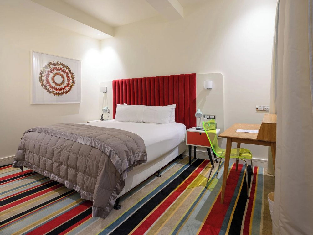 Hotel Debrett room with modern design and colorful accents