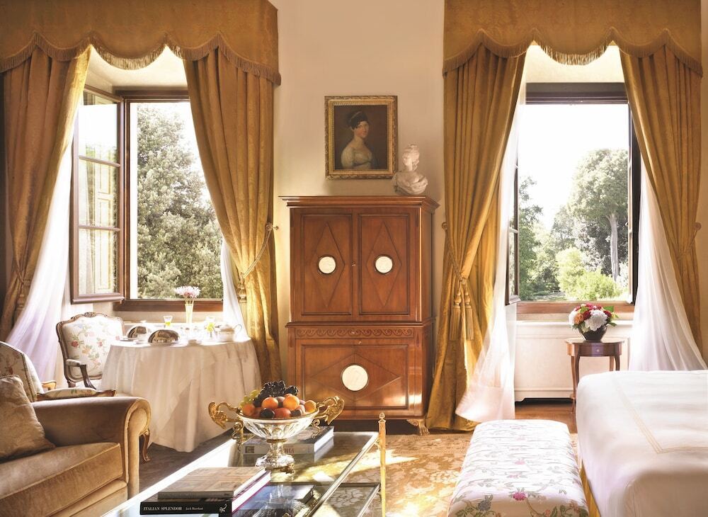 Classic suite interior at Four Seasons Hotel Firenze with garden views